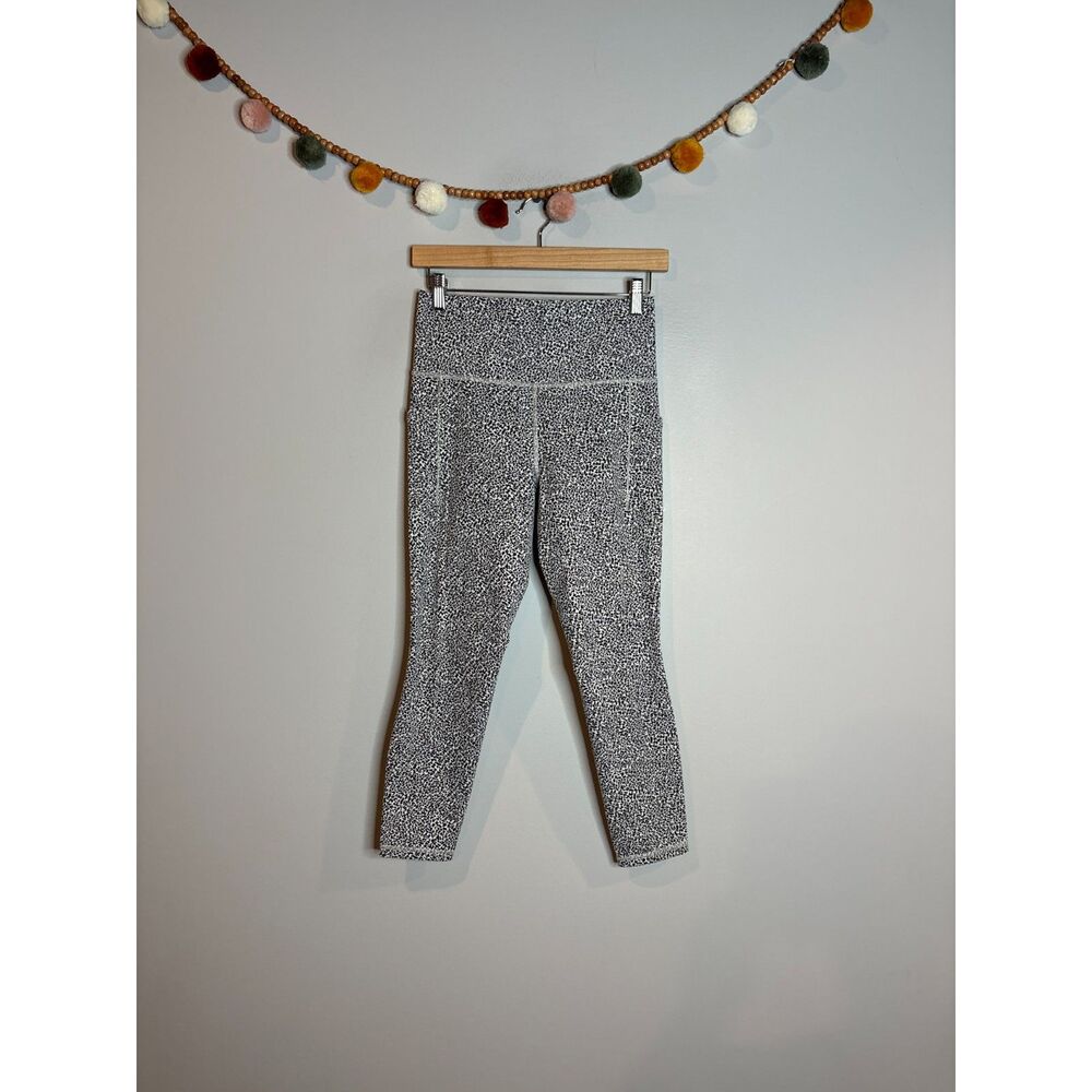 Athleta Salutation Stash Textured Tight leggings animal print